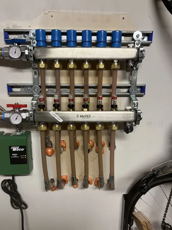 Plumber performing Gas Line Installation at a residential property in Bar Harbor